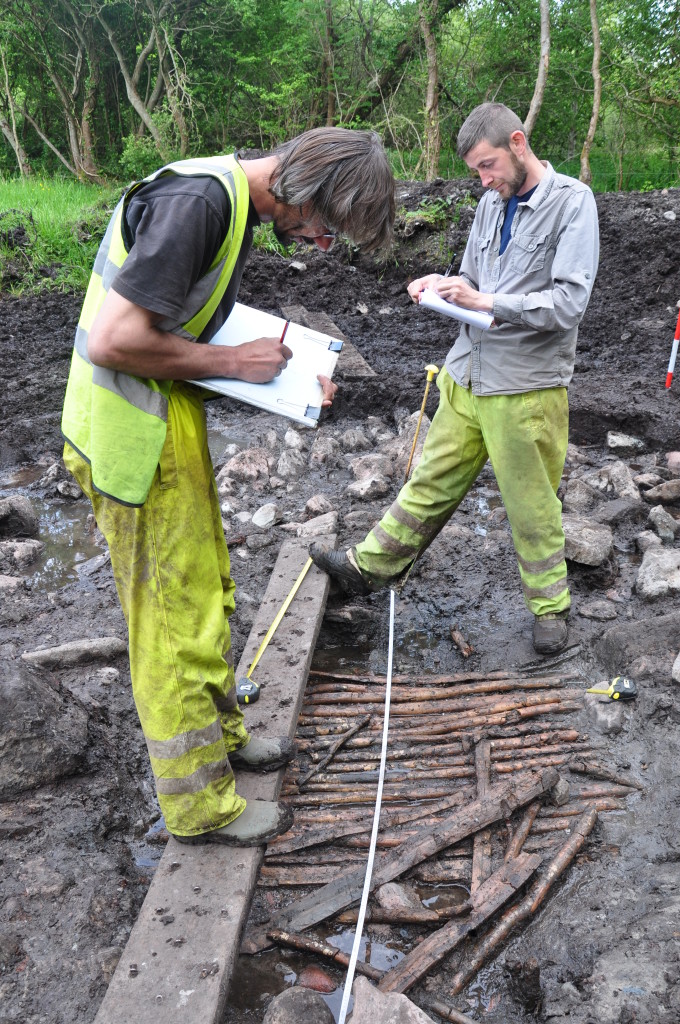Rubicon's Hubert Ficner and Martin McGowan planning prehistoric worked timbers at Drumard 2, Co. Mayo (James Hession)