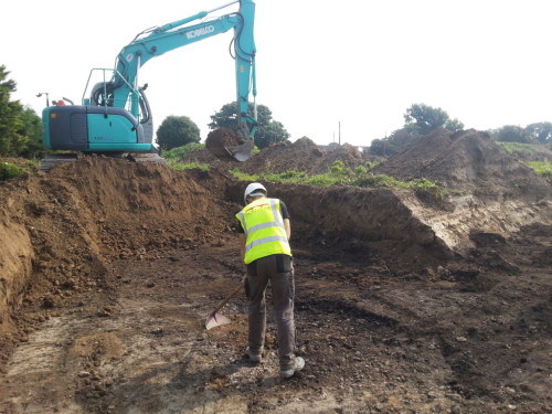 Rubicon's George Morgan works to find the extent of a burnt mound